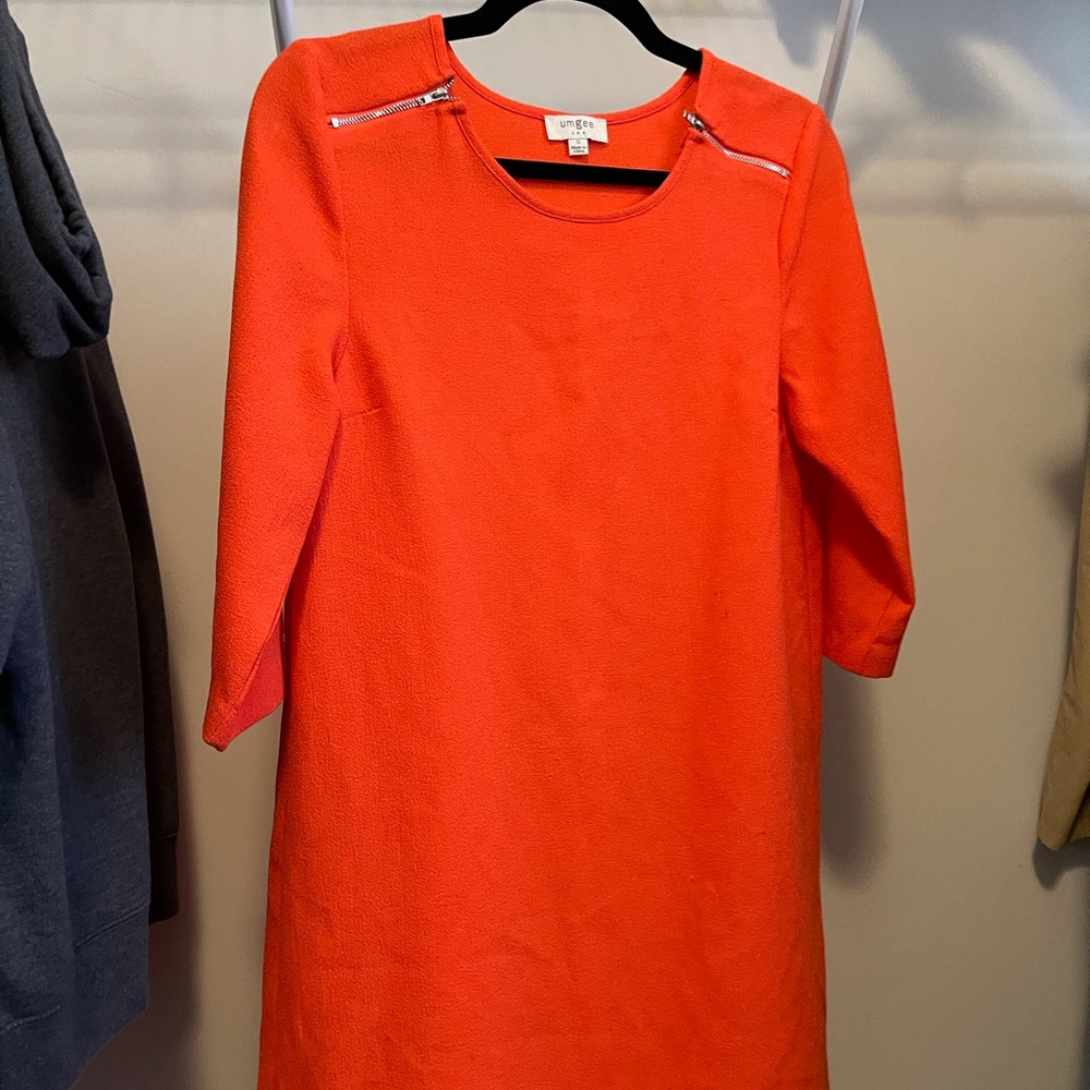 Orange Boutique Dress with adorable pleated sheer on back.